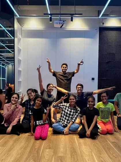 Photos from a contemporary and jazz workshop, showing a diverse group of students learning together. My classes are a great way to meet people and be part of a community.