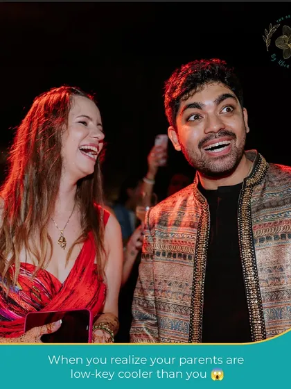The groom's look of happy surprise when he realizes his parents are the coolest dancers on the floor. These intergenerational moments of joy are priceless.