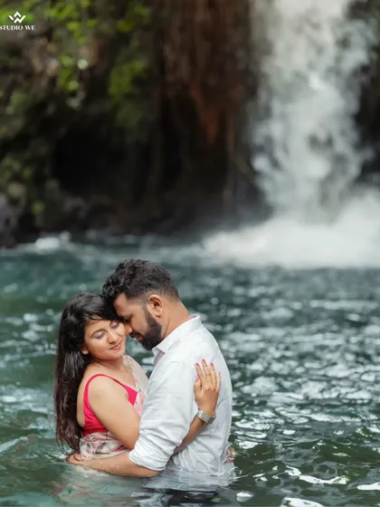 A beautiful, intimate portrait of a couple during their waterfall pre-wedding shoot. This highlights our adventurous side and our ability to capture romance in any setting.