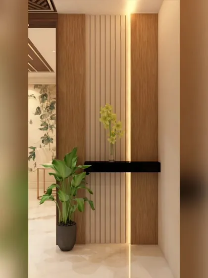 An entry foyer designed with minimalist principles, featuring vertical wood and fluted panels with integrated LED strip lighting. A simple floating shelf and a potted plant add a touch of warmth and nature to this clean and modern entrance.