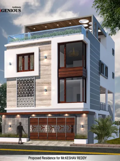 This design for Mr. Keshav Reddy features a prominent bay window and a decorative jalli screen. The elevation is carefully lit to highlight its architectural features, including the rooftop terrace with a glass railing.