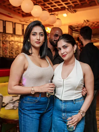 Friends enjoying a drink and the classic tunes. The relaxed yet energetic atmosphere of Monkey Bar is perfect for a Friday night.