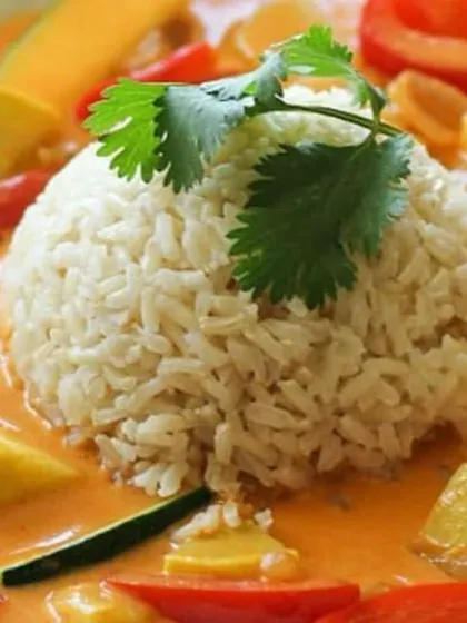 Our Thai Red Curry is a fragrant and flavorful dish, packed with fresh vegetables and served with steamed rice. It's a wonderful main course option for any event.