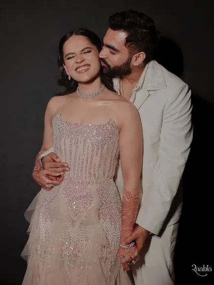 A playful and affectionate moment between Viraj and Palak, showing their fun-loving connection.