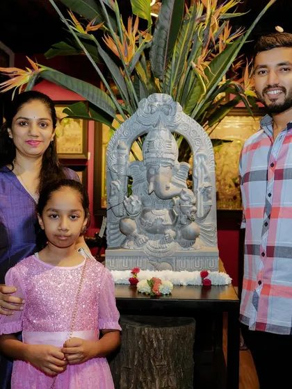 Happy clients with their new Ganesha statue. It's a joy to help people find the perfect piece for their home, whether they are collectors, designers, or art lovers.