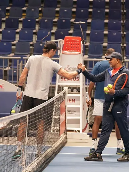 A handshake of respect with our hitting partner after a training session.