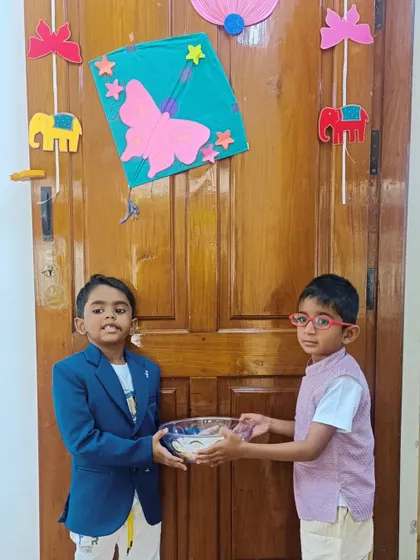 Our little gentlemen exchange greetings and 'Yellu Bella' during the Sankranti festival, dressed smartly for the occasion.