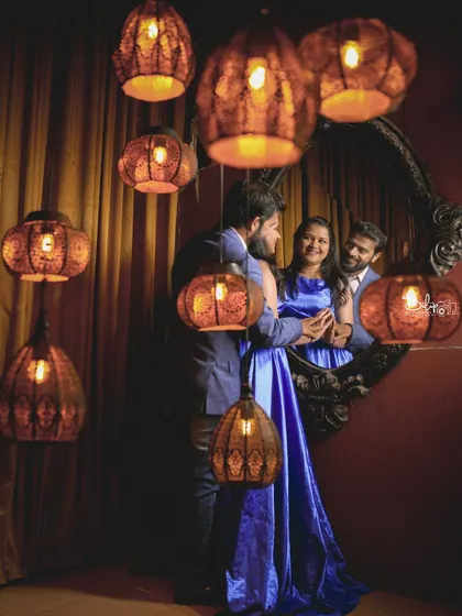 A creative shot in our royal room, using the mirror and hanging lamps to create a multi-layered and interesting portrait.