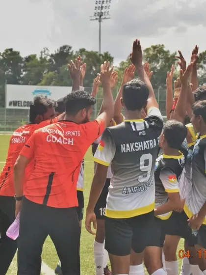Team huddle. The U-15 team gets together for a moment of unity and strategy during a KYPL match.