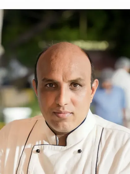 A portrait of one of our senior chefs. The experience and expertise of our culinary leaders are the foundation of our celebrated menus and food quality.