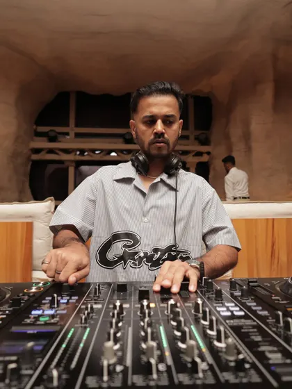 A straight-on shot of me at the Pioneer console. I only use professional-grade gear because sound quality is non-negotiable.