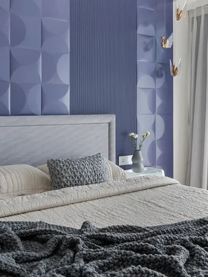 Another detail shot of the lavender bedroom, focusing on the texture of the 3D wall panels and the soft, serene bedding.