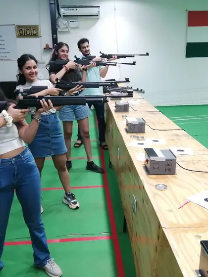 This group is having a great time learning to shoot. Notice the smiles even while they're concentrating. It's all about having fun while learning a new skill.