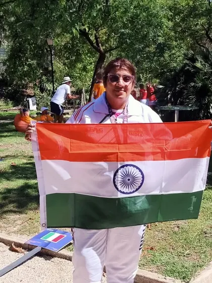 Our director proudly holding the Indian flag in Portugal. This level of experience and passion is what we bring to our coaching every single day.