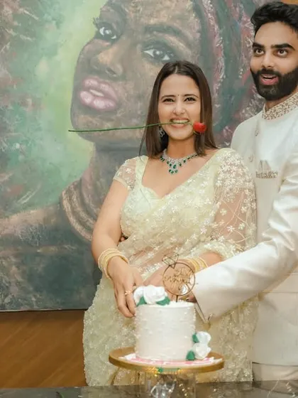 A beautiful shot of the couple cutting their engagement cake together. I focus on capturing these milestone moments with artistry.