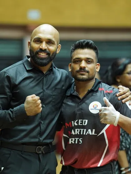 A moment with a fellow referee at an MMA event. We share the responsibility of ensuring a fair fight.