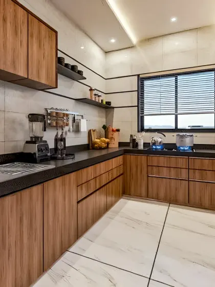 This L-shaped kitchen features beautiful light wood cabinets and a dark, textured countertop. The design includes open shelving for easy access to everyday items and ample storage, creating a functional and aesthetically pleasing cooking space.