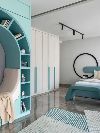 This kids' bedroom is a perfect blend of playfulness and practicality. The room features a cozy reading nook, ample storage, and a soothing color palette, all thoughtfully chosen to create a space that delights both parents and children.