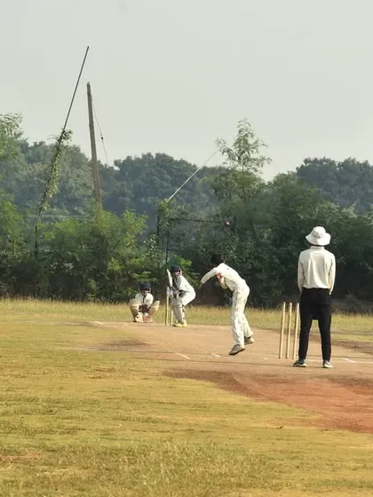 A wide shot of a match in progress in Hyderabad, showing our players in their fielding positions.
