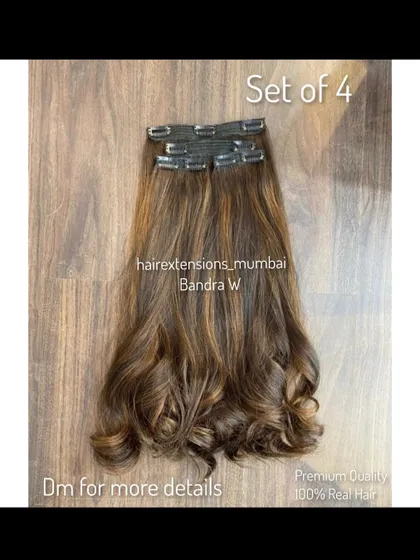 A set of 4 clip-on extensions with highlights and a soft curl at the ends. Perfect for a glamorous, styled look.