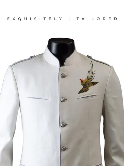 This two-tone bandhgala with a single embroidered bird on the pocket is a playful yet elegant piece. It’s for the man who enjoys a touch of retro class in his wardrobe.