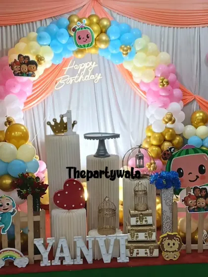 A Cocomelon theme with a pastel color palette and a 'Happy Birthday' neon sign.