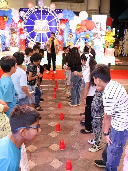 Our energetic anchor leads a fun group game, keeping the kids engaged and entertained. Interactive games are a key part of making a party memorable.