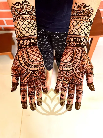 A beautiful non-bridal design from my team, featuring peacocks and intricate jaal work.