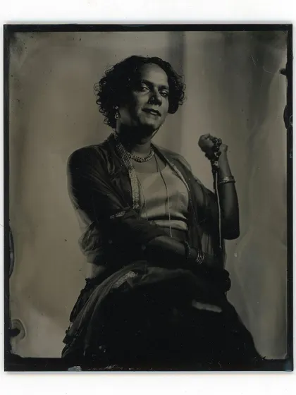 A stunning wet plate collodion portrait of a trans woman, capturing her grace and strength. Each plate is a one-of-a-kind object, making these portrait sessions a truly special experience.