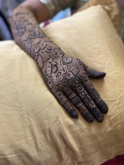 This is a detailed view of my intricate bridal henna work. Each design is unique, combining traditional patterns like paisleys and mandalas with fine-line fillers to create a stunning, full-coverage look for your special day.
