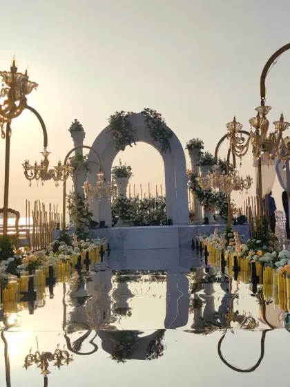 The stunning beachside mandap setup for Keerthy Suresh's wedding. This was our inspiration for the background of their live painting.
