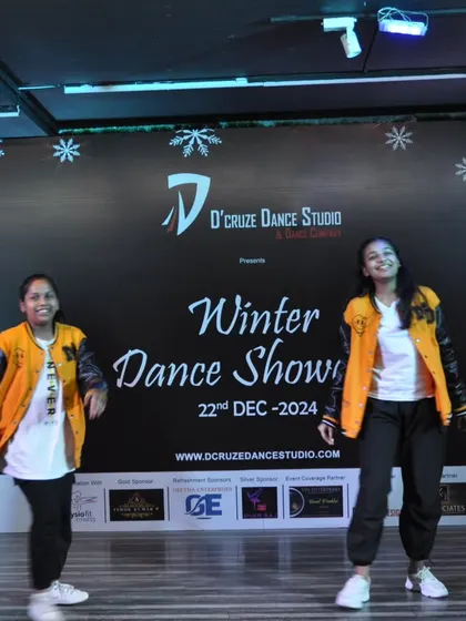 All smiles during this fun duo performance at the Winter Dance Showcase.