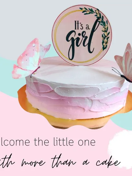 Welcome a little one with this sweet "It's a girl" cake. The gentle pink ombre design, adorned with delicate butterflies, is a perfect centerpiece for a baby shower or to celebrate a newborn's arrival.