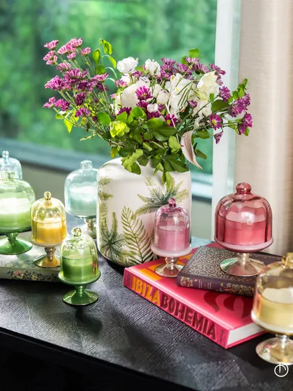 Bask in the Sundance Aura. These intricately designed, hand-poured fragrances in footed bell jars make a perfect gift for the ones who matter most, adding a pop of color and a beautiful scent to their home.