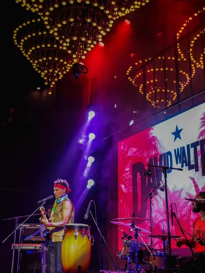The stage is alive with the soulful Afro-Caribbean rhythms of French artist David Walters during our Fête de la Musique celebration. This shot captures the electrifying atmosphere of our live music concerts, where international artists connect with a packed Delhi audience.