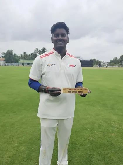 A student proudly displays his 'Man of the Match' award after a stellar performance on our home ground.