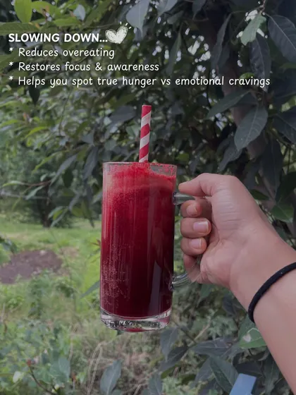 Slowing down to enjoy a fresh beetroot juice. Taking a moment to pause and sip mindfully helps reduce overeating and restores focus.