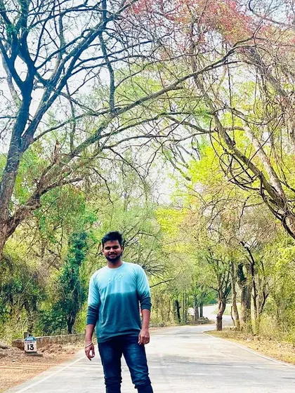 The beautiful canopy of trees makes the journey to Hogenakkal memorable.