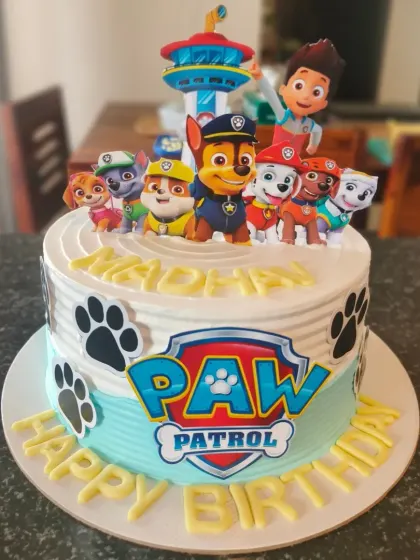 Paw Patrol is on a roll! This cake features the whole team of pups, ready for a rescue mission on a fun, themed birthday cake.
