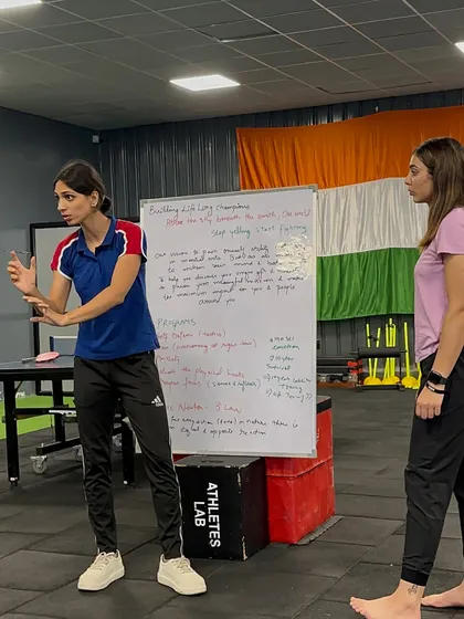 Our coach demonstrates a technique during a self defense workshop. We believe knowledge is power, and these sessions are designed to provide practical skills for personal safety.