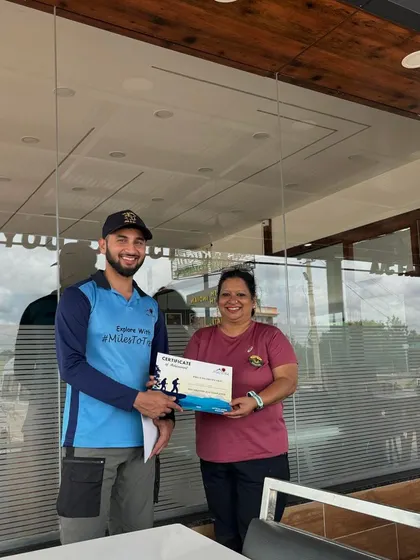 A participant receiving her certificate from our trek leader. This personal touch and recognition is an important part of the Miles To Trek experience.
