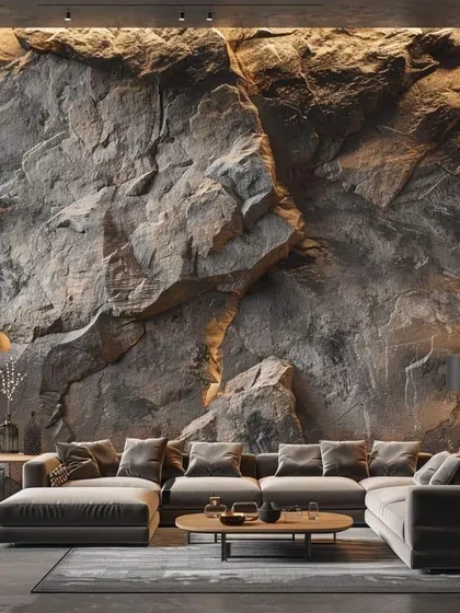 A dramatic living room with a full-wall rock texture. This design brings the raw beauty of nature indoors, creating a powerful and unique focal point.