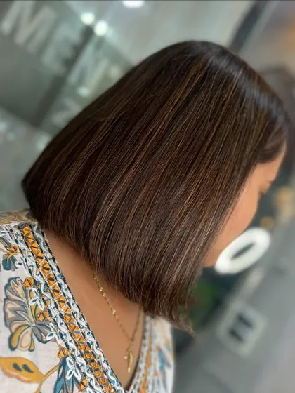 The sweet sophistication of our Smooth Caramel Brown on a sleek, modern bob.