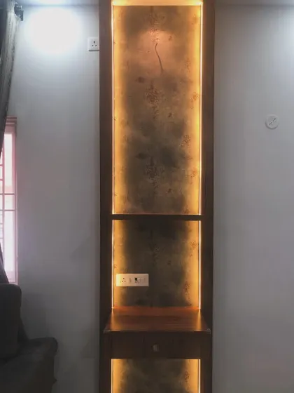 The same shelving unit, now with backlighting turned on, which highlights the texture of the wallpaper.