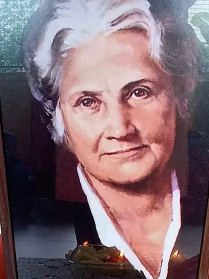 A portrait of Dr. Maria Montessori, the founder of the educational philosophy we follow.