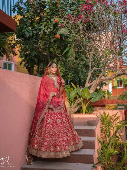 The bride, ready for her big day, in a moment of quiet anticipation at her Goa wedding venue.