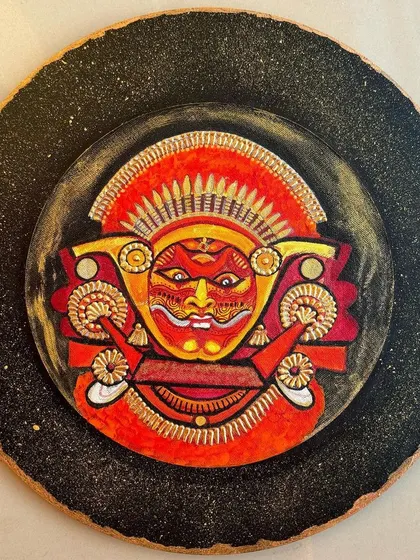 A duplicate image of the Theyyam plate, emphasizing its dramatic and spiritual presence.