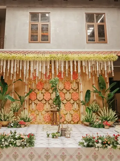 A traditional Chettinad house offers a story in every corner. We designed this courtyard wedding to honor its cultural beauty, using classic flower arrangements and brass elements to create an authentic and intimate ceremony space.