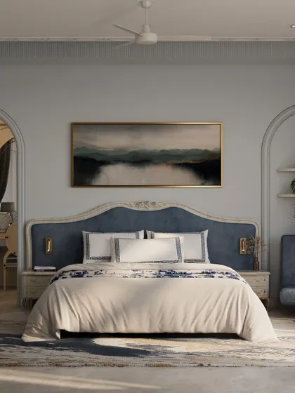A full view of the master bedroom, showcasing the harmony between the classical carved headboard, the serene landscape art, and the arched doorways leading to the dressing area.
