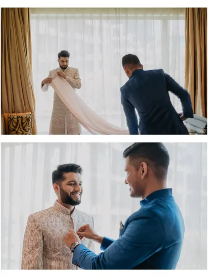 The groom getting help from his best man, sharing a smile and a hug, capturing the bond of brotherhood.
